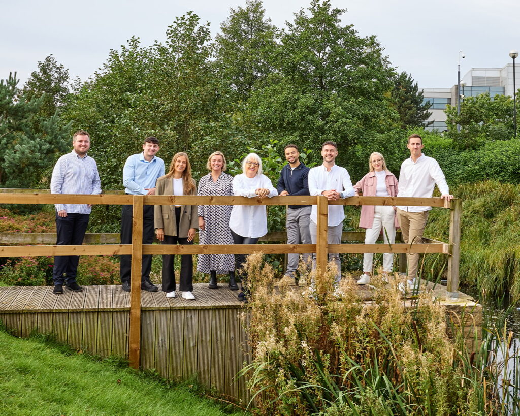 Marmion team photo on the decking outside the Marmion office